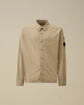 Camisa de manga larga de popelín con lente y botones