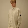 Camisa de manga larga de popelín con lente y botones