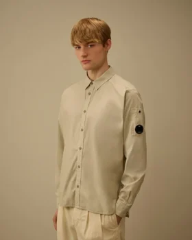 Camisa de manga larga de popelín con lente y botones