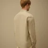 Camisa de manga larga de popelín con lente y botones