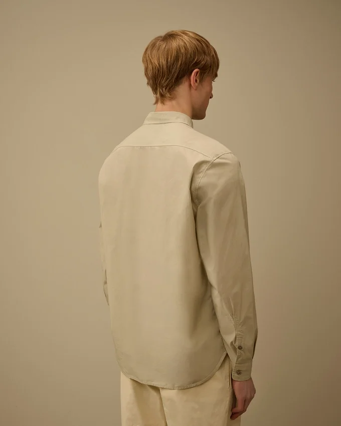Camisa de manga larga de popelín con lente y botones