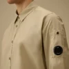 Camisa de manga larga de popelín con lente y botones