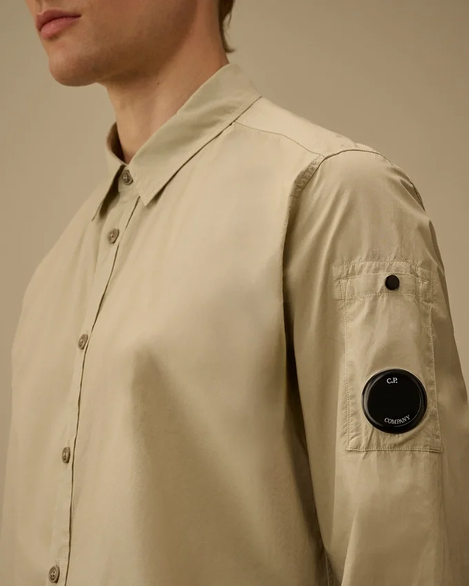 Camisa de manga larga de popelín con lente y botones