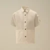Camisas de manga corta con botones y lente de algodón popelín U16