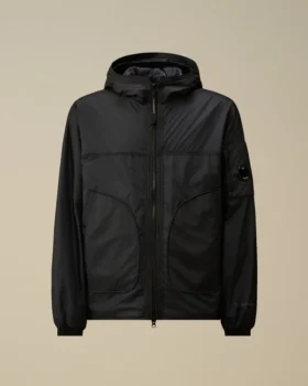 Chaqueta con capucha y detalle de lente «Lens» de Nada Shield, confeccionada con Primaloft® Evolve y plegable