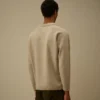 Jersey de chenilla de algodón con lente tipo polo