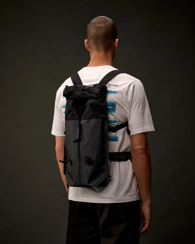 Metropolis Series rubber rep backpack with transformable design and logo