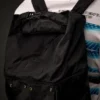 Metropolis Series rubber rep backpack with transformable design and logo
