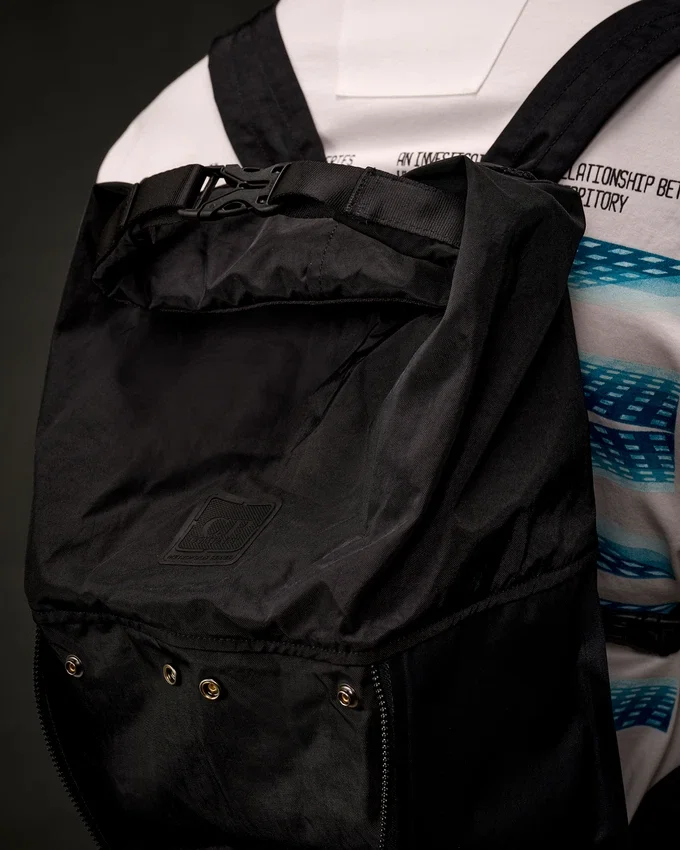 Metropolis Series rubber rep backpack with transformable design and logo