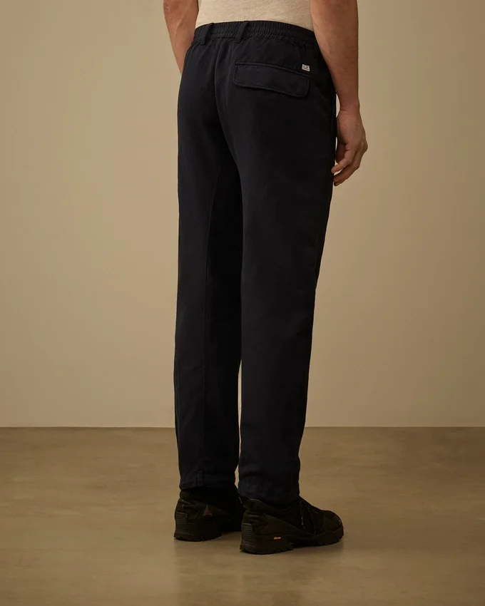 Pantalones cargo elásticos de algodón y lino con detalle de lente
