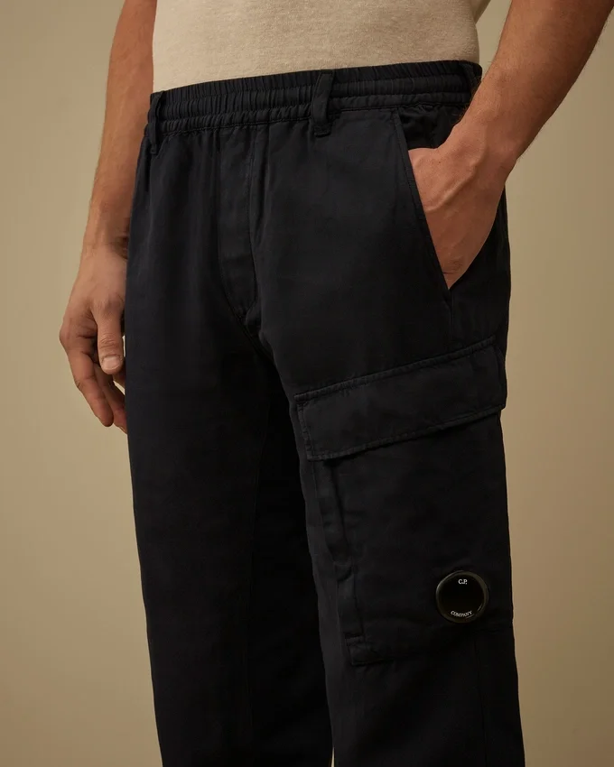 Pantalones cargo elásticos de algodón y lino con detalle de lente