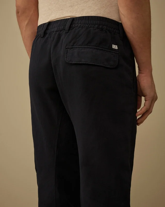 Pantalones cargo elásticos de algodón y lino con detalle de lente