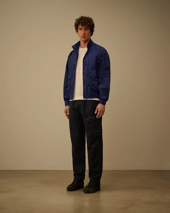 Pantalones cargo elásticos de algodón y lino con detalle de lente