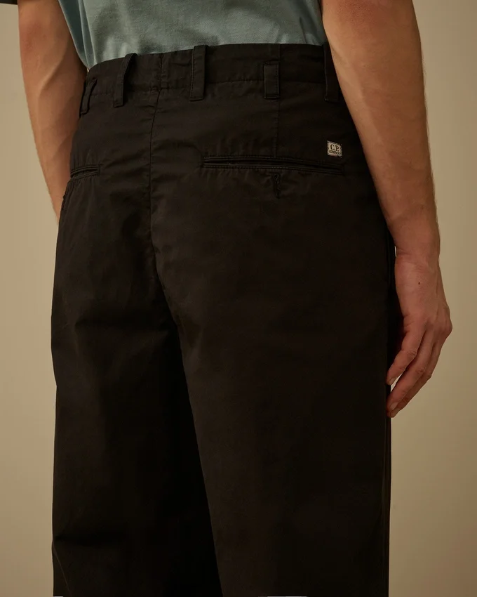 Pantalones holgados con pinzas de gabardina de algodón