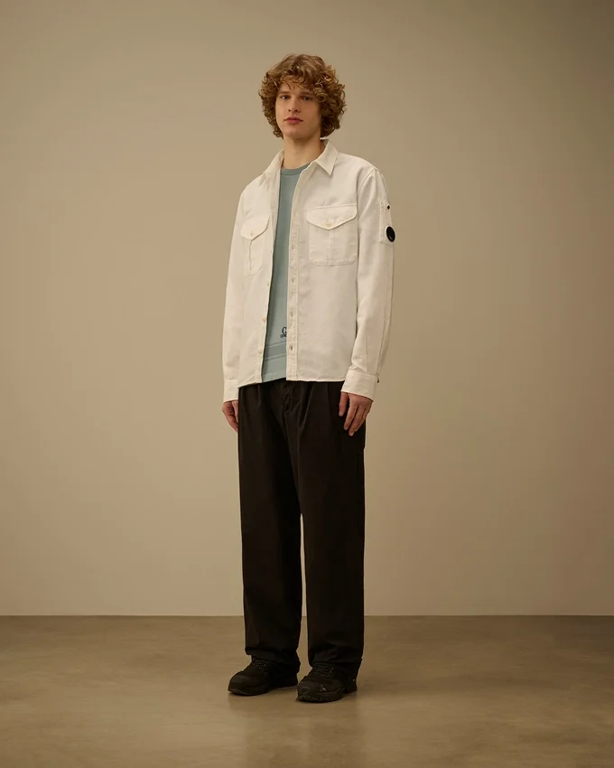 Pantalones holgados con pinzas de gabardina de algodón