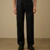 Pantalones holgados de denim 3/1