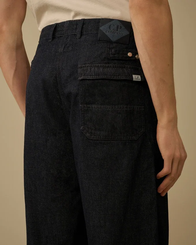 Pantalones holgados de denim 3/1