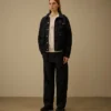 Pantalones holgados de denim 3/1