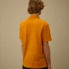 Polo de manga corta con bolsillo en el pecho de piqué elástico