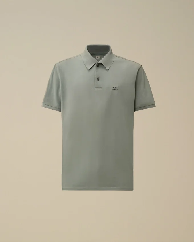 Polo de manga corta con cuello en punta de piqué elástico
