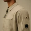 Sobrecamiseta con cremallera para lentes de gabardina orgánica